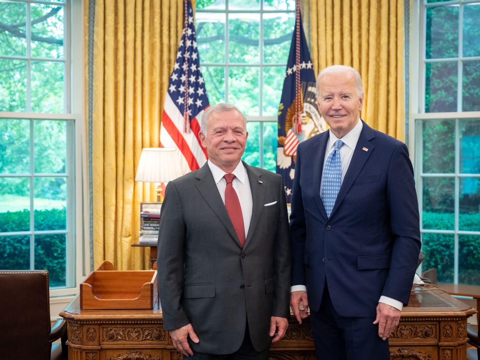 ملك الأردن وبايدن يؤكدان الالتزام بتسهيل إيصال المساعدات الإنسانية لغزة