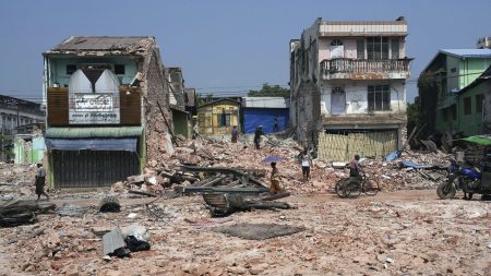 rewrite this title in Arabic Myanmar earthquake survivors in dire need of aid one month on, UN warns