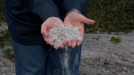 rewrite this title in Arabic Video. Severe storms lash southern Poland, causing widespread damage
