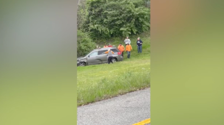 Good Samaritans help woman trapped in car