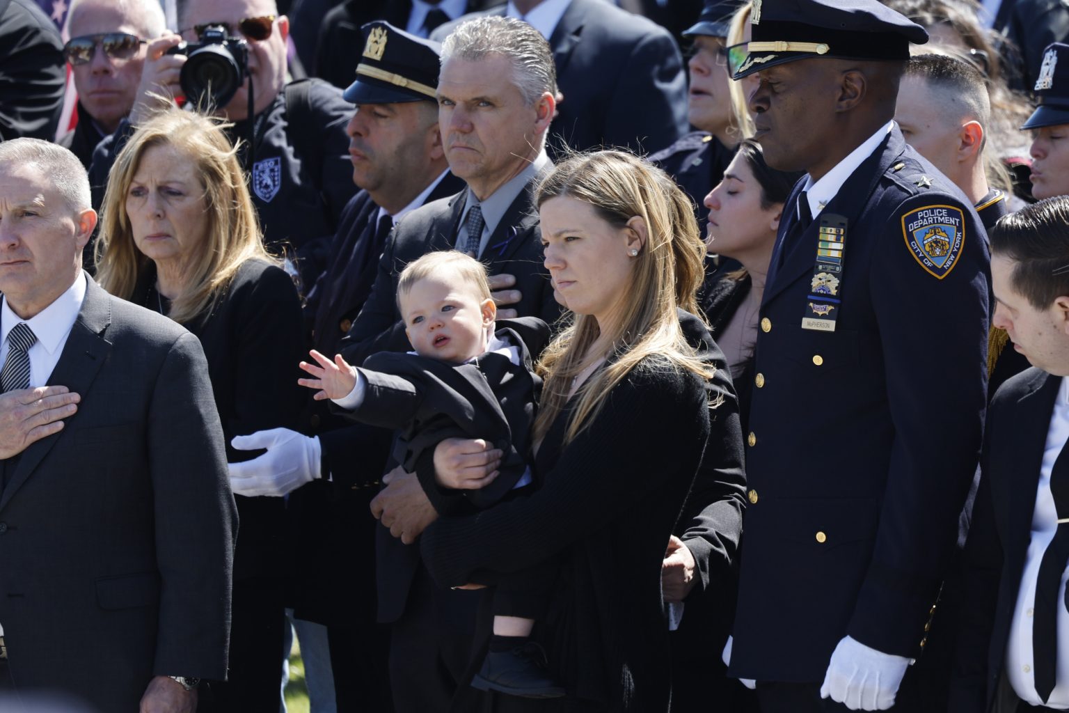 slain cops wife funeral