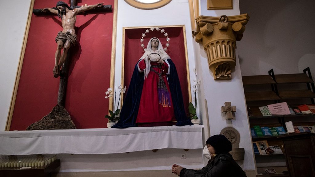 woman praying AP