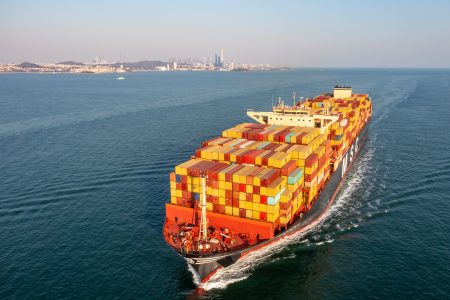 container ship sails near qingdao