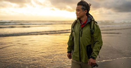 male walking beach 1200x628 facebook