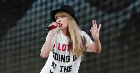 Taylor Swift Adorably Matches With Young Fan Who Got the 22 Hat at the Cardiff Eras Tour Show 615