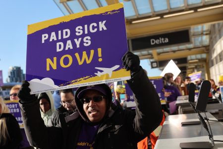 airport workers supporters march