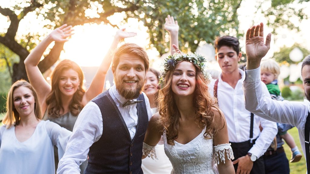 bride and groom with guests