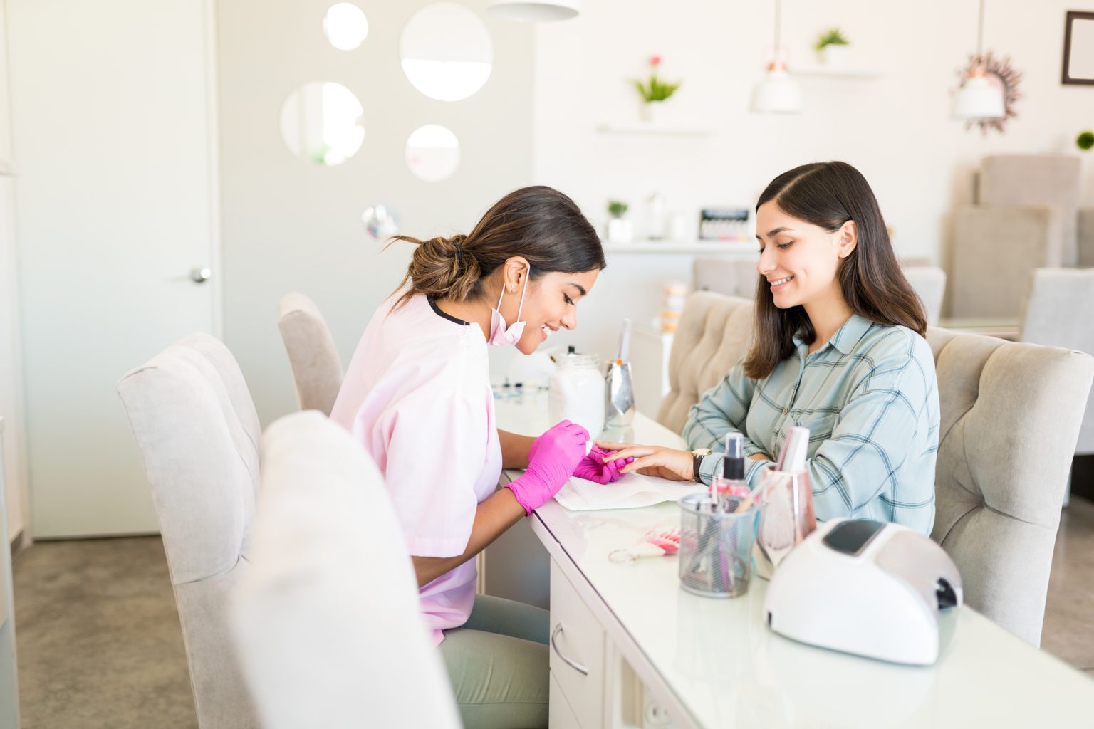 nail salon manicurist client