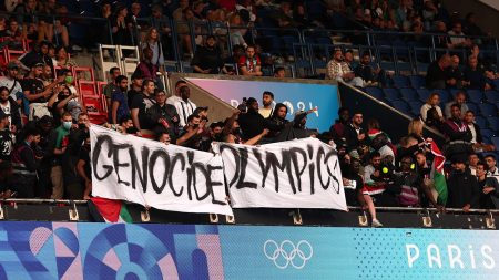 Genocide Olympics Sign