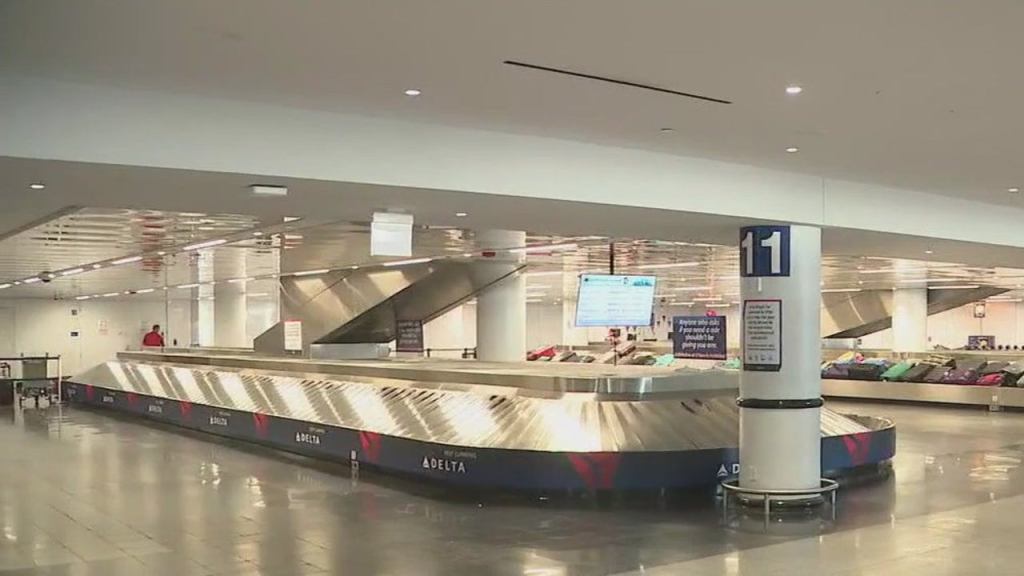 Woman dies at OHare Terminal 5 baggage area after getting entangled in conveyer belt system