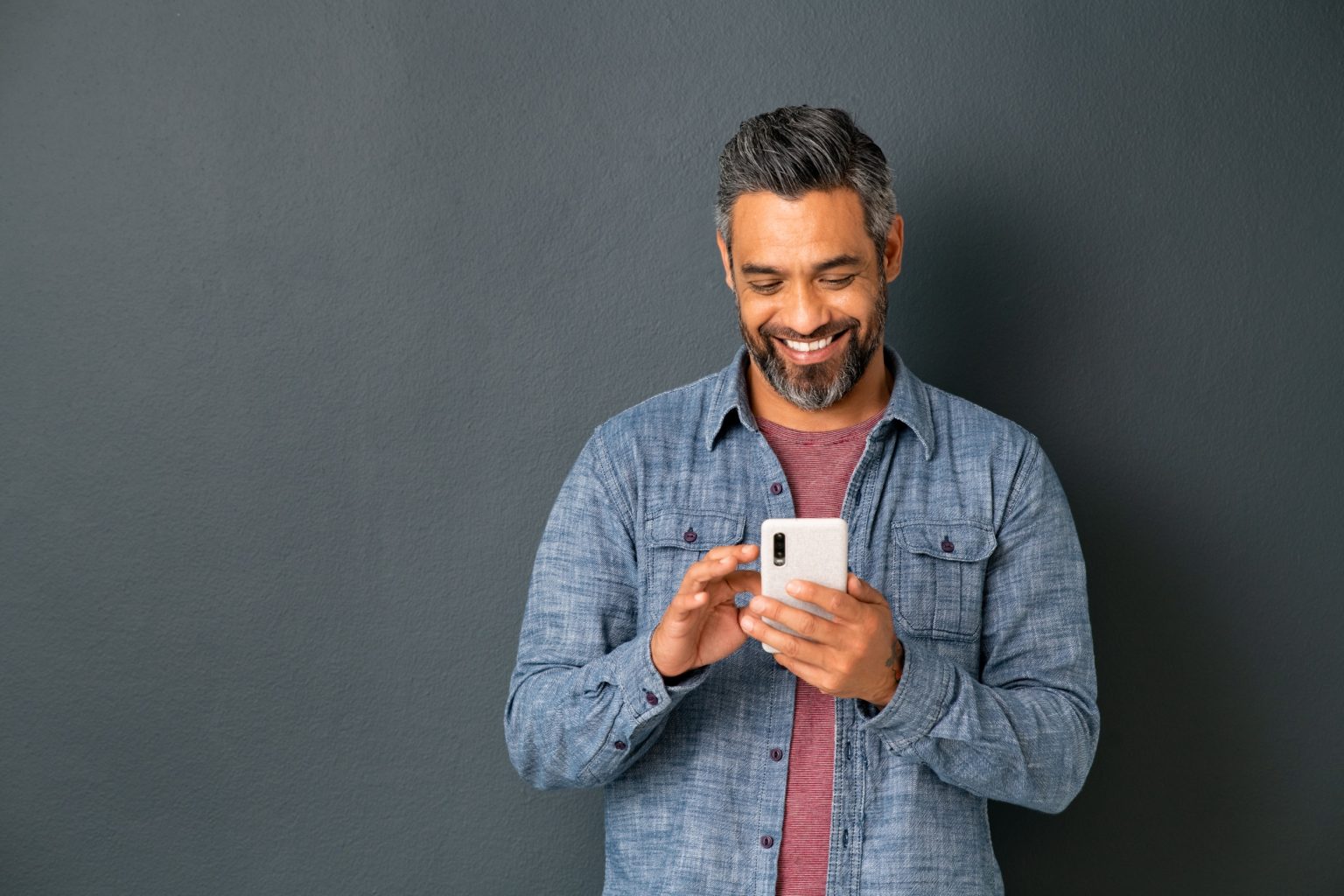 man holding mobile phone