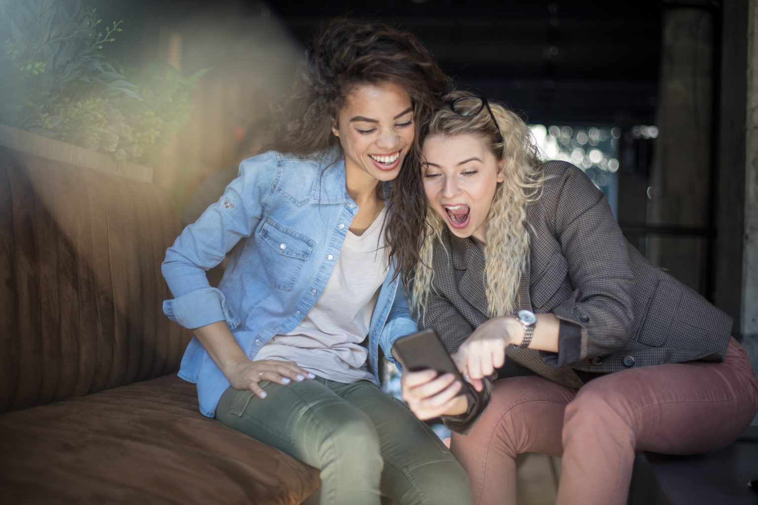 two women shocked phone