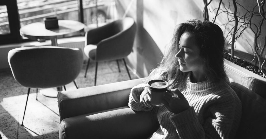 female drinking coffee 1200x628 facebook