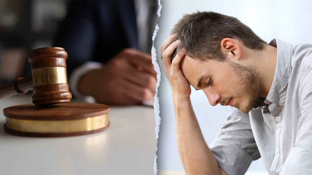 lawyer court papers sad man