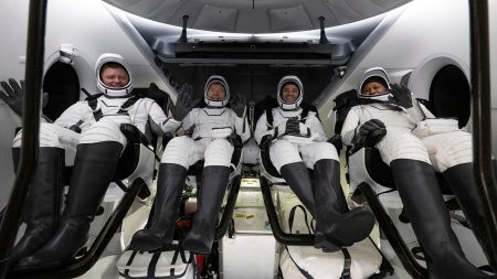 astronauts in capsule