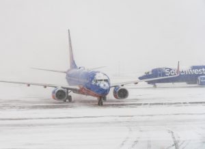 flight delays cancellations winter storms thanksgiving