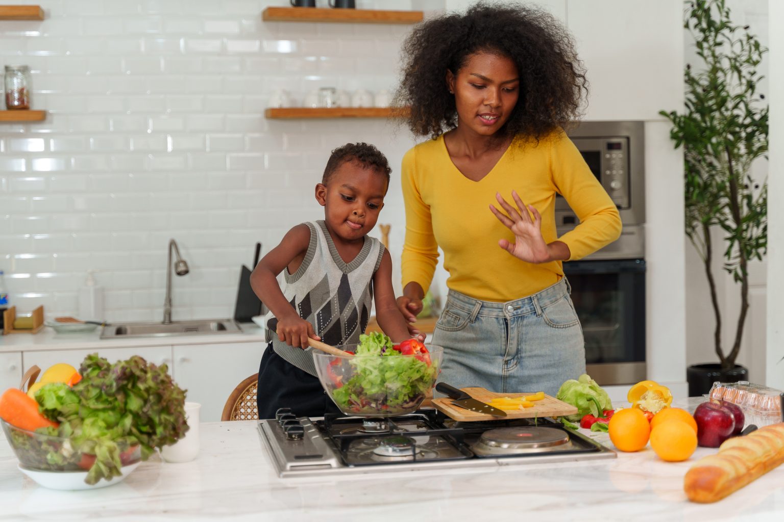 stock image woman son cooking