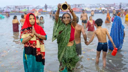 india maha kumbh festival pouring pitcher