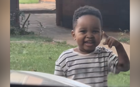 little boy greets his mom