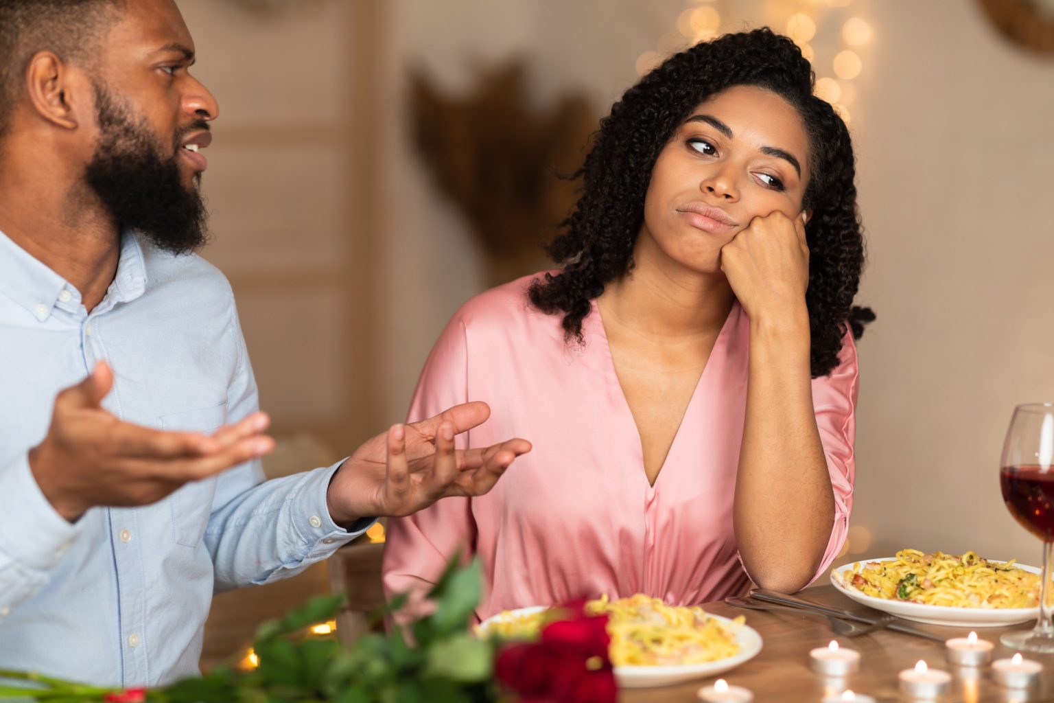 unhappy couple dinner stock image