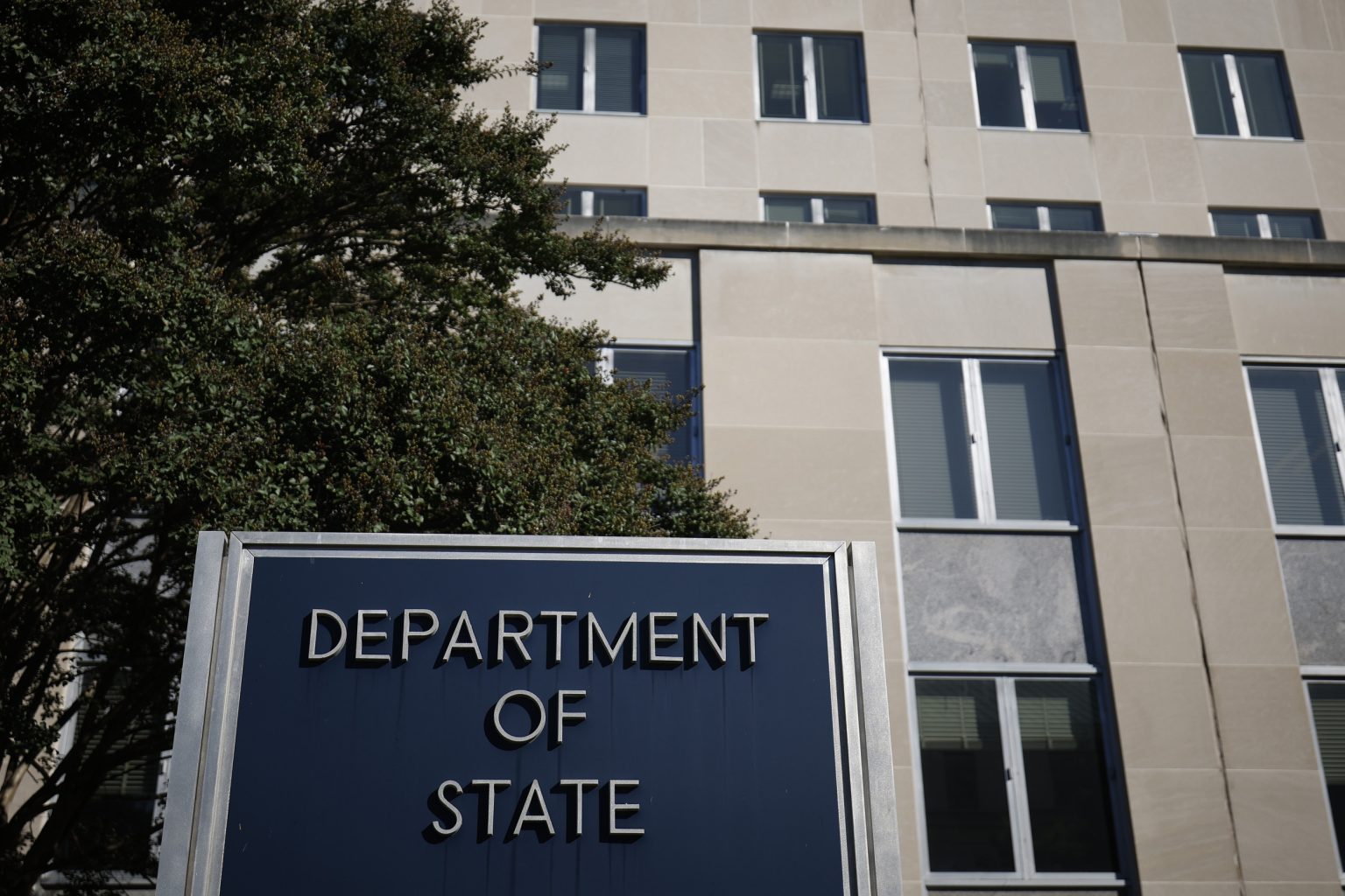 rewrite this title US Official Accused of Leaking National Defense Secrets department state