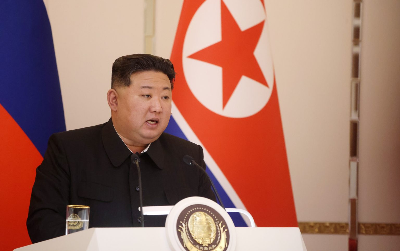 rewrite this title North Korea Unveils Nuclear Missile Submarine for First Time north korean leader kim jong un