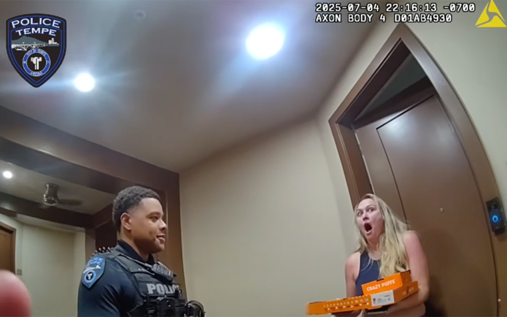 customer surprised by cops delivering pizza