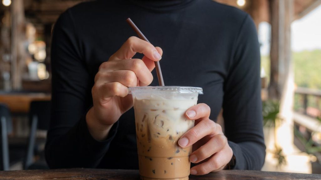 iced coffee on table with straw