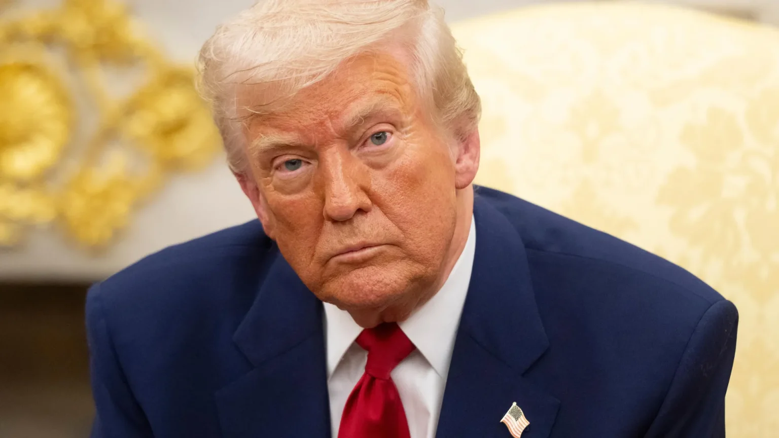 president donald trump seated close up.webp