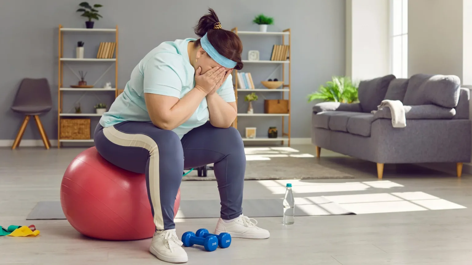 sad tired overweight woman exercising.webp