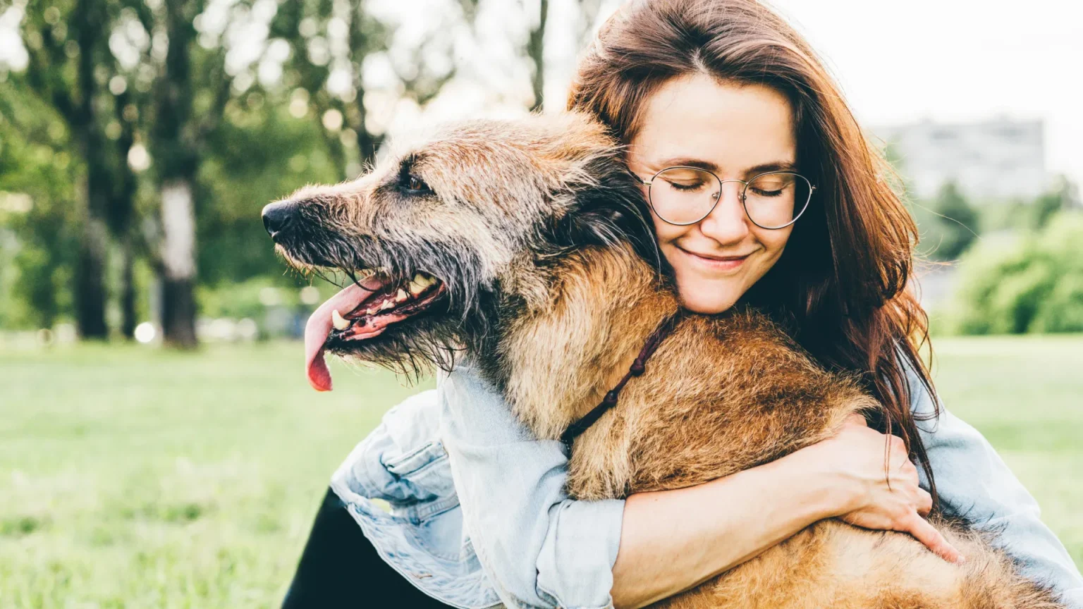 woman hugging dog.webp