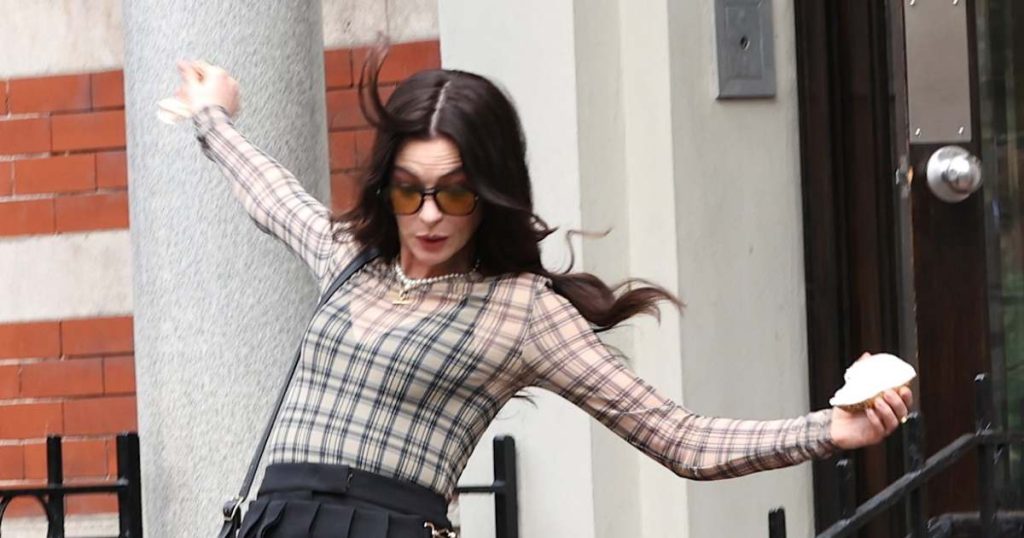 GettyImages 2231701491 Anne Hathaway Falls on The Devil Wears Prada 2 Set