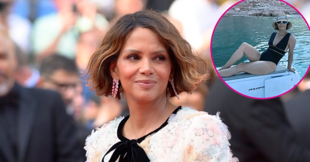 Halle Berry Shows Off Her Curves in Plunging Swimsuit feature