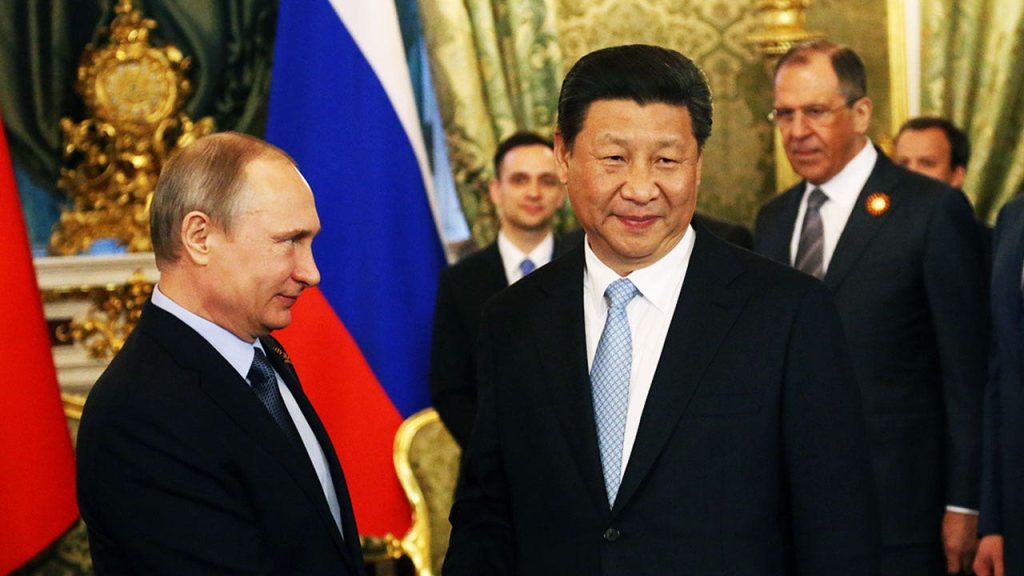 lavrov looks at putin xi