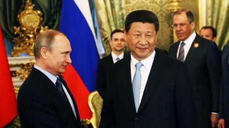 lavrov looks at putin xi