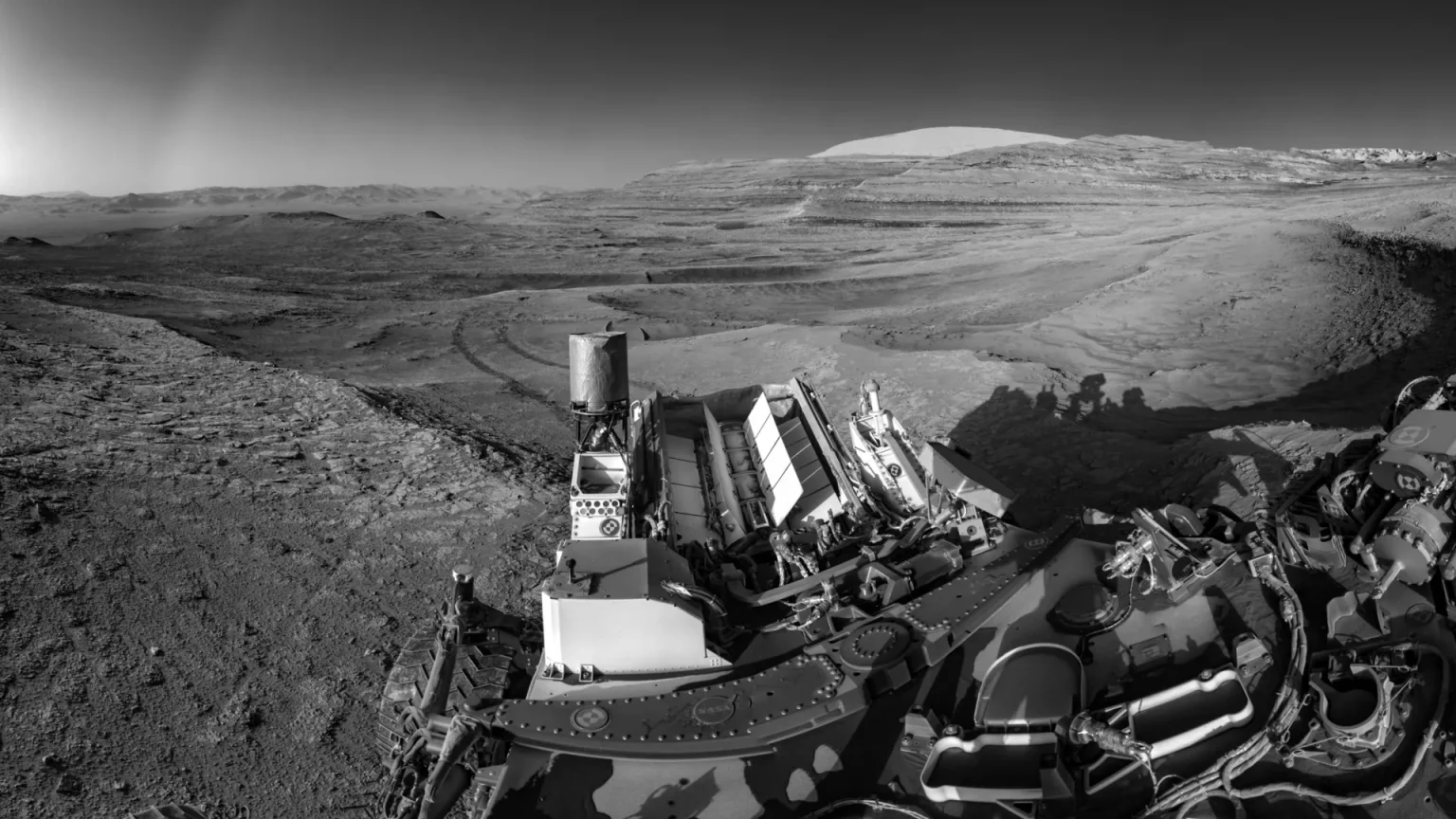 nasa curiosity rover tracks on mars.webp