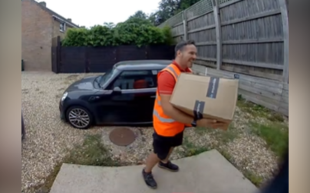 package being delivered mailman
