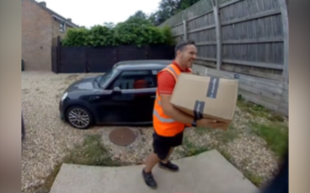 package being delivered mailman