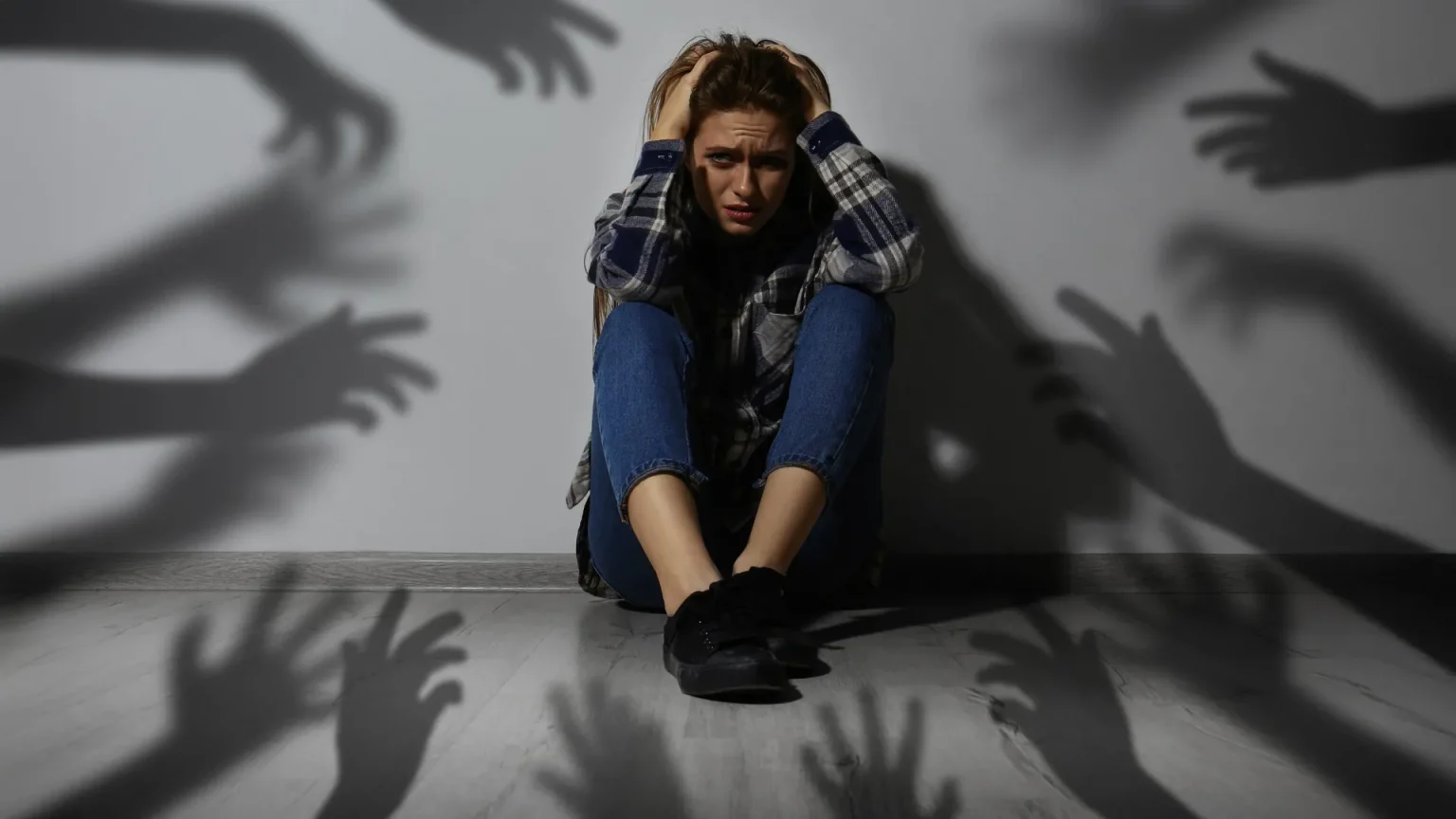 paranoid delusion scared woman.webp