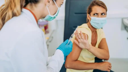 woman refusing vaccine.webp