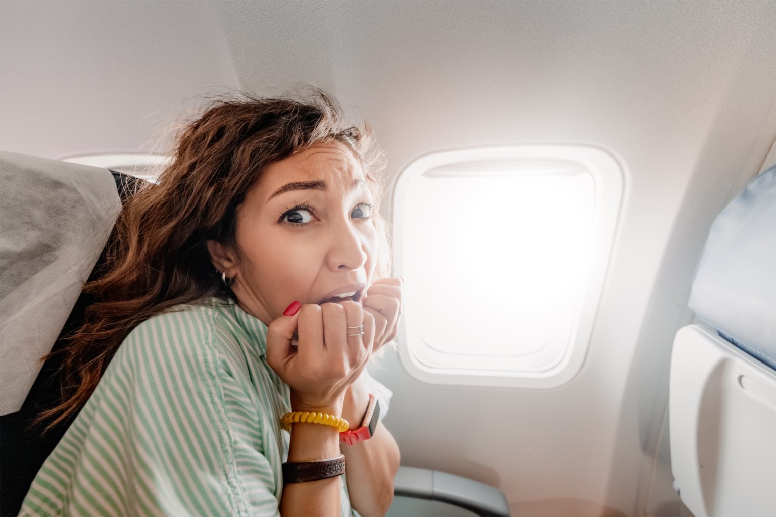 woman scared plane