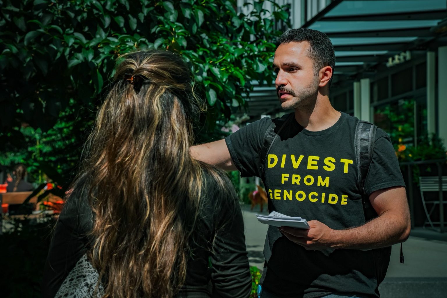 Ahmed Conversing With Amazon Worker at re invent 2