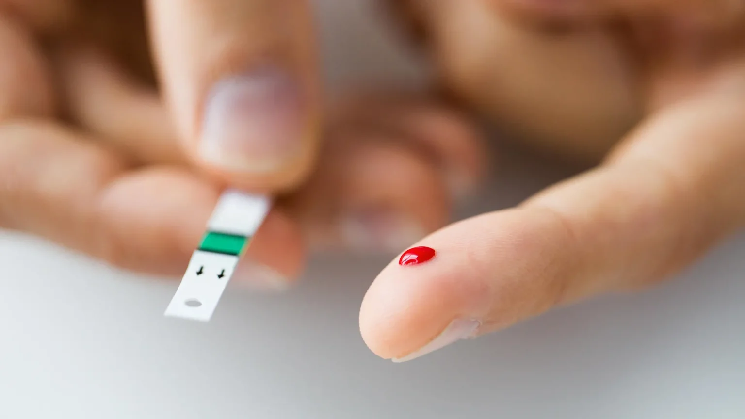 diabetes test blood drop finger.webp
