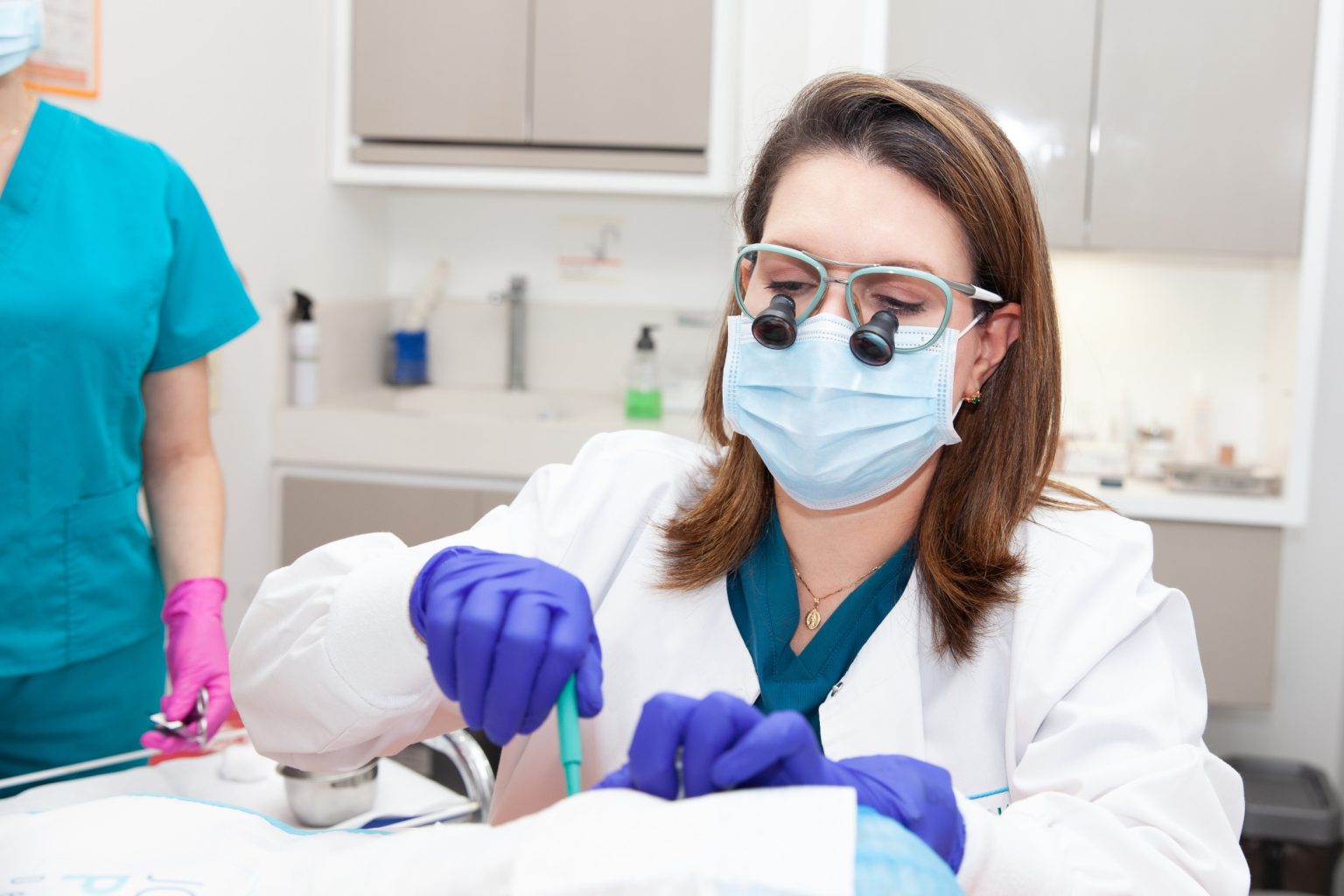 doctor carrying out form skin biopsy