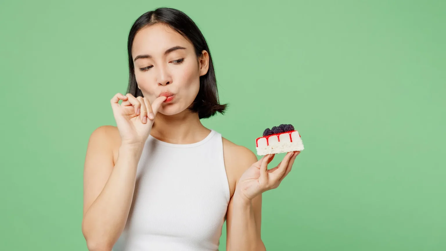 eating cake licking fingers.webp