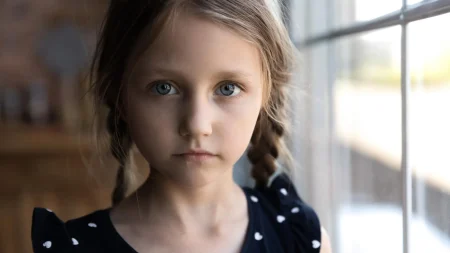 Array sad serious little girl.webp